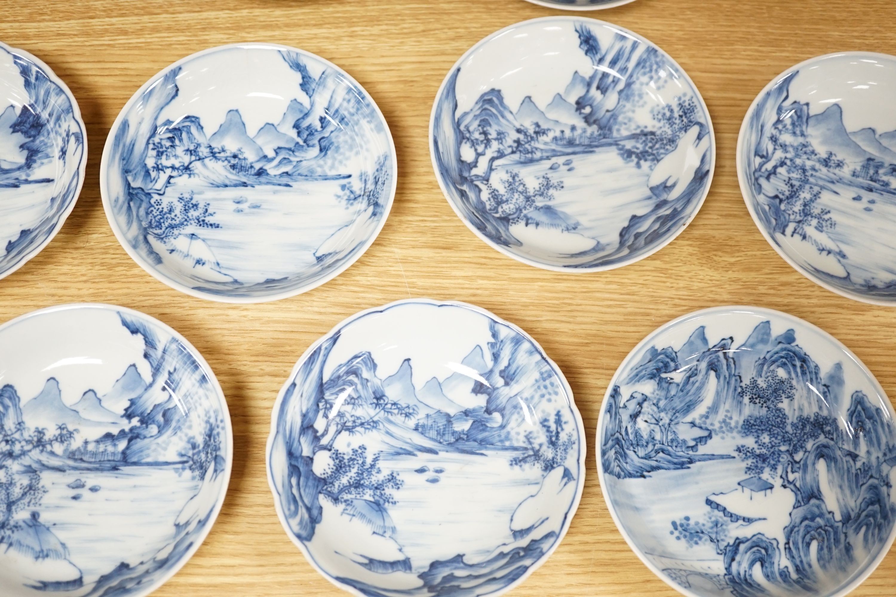 Ten Chinese blue and white ‘landscape’ dishes, 13.5cm diameter